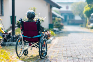 Elderly woman in wheelchair